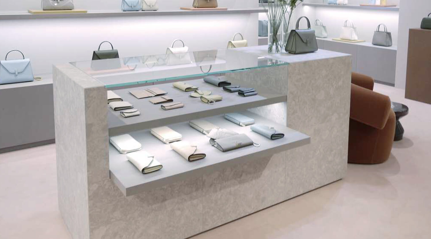 国内メーカーのタイルを採用した店内中央のカウンター　の画像